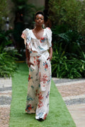 Silk suit, palazzo trousers, top with ruffles on the armholes, complete with sash
